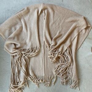 Soft open poncho sweater with fringe